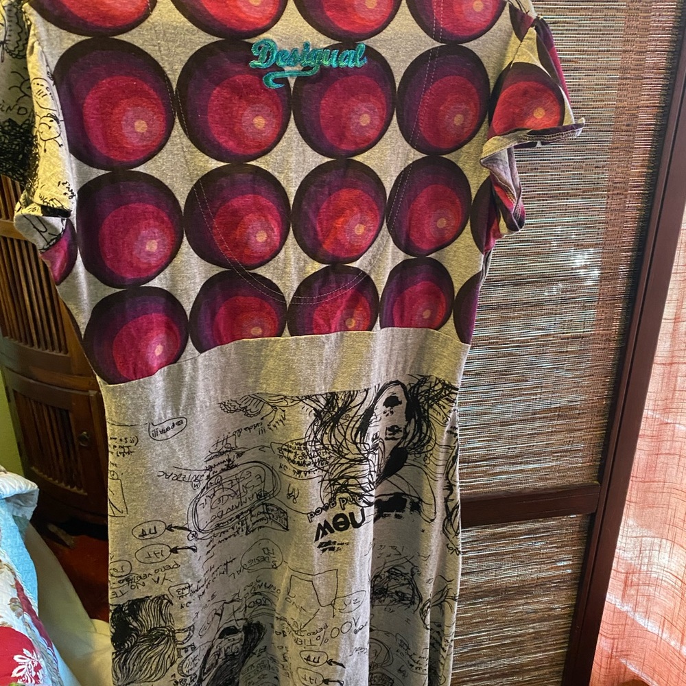 Super cute and unusual lightweight summer dress.